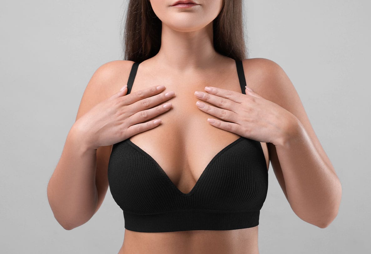 woman after her breast augmentation in Newport News, VA