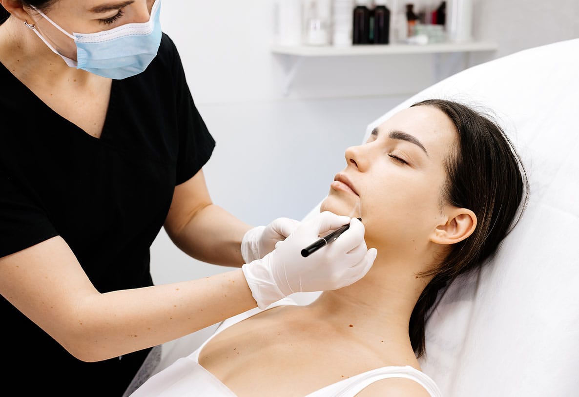 patient having a consultation with her plastic surgeon in Hampton Roads