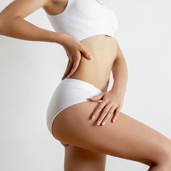 woman after getting liposuction in Williamsburg, VA