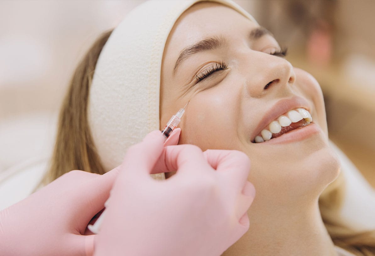 woman getting botox in Williamsburg, VA