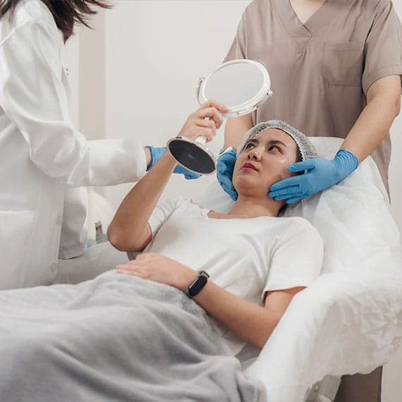 woman having a consultation with her plastic surgeons in Newport News, VA